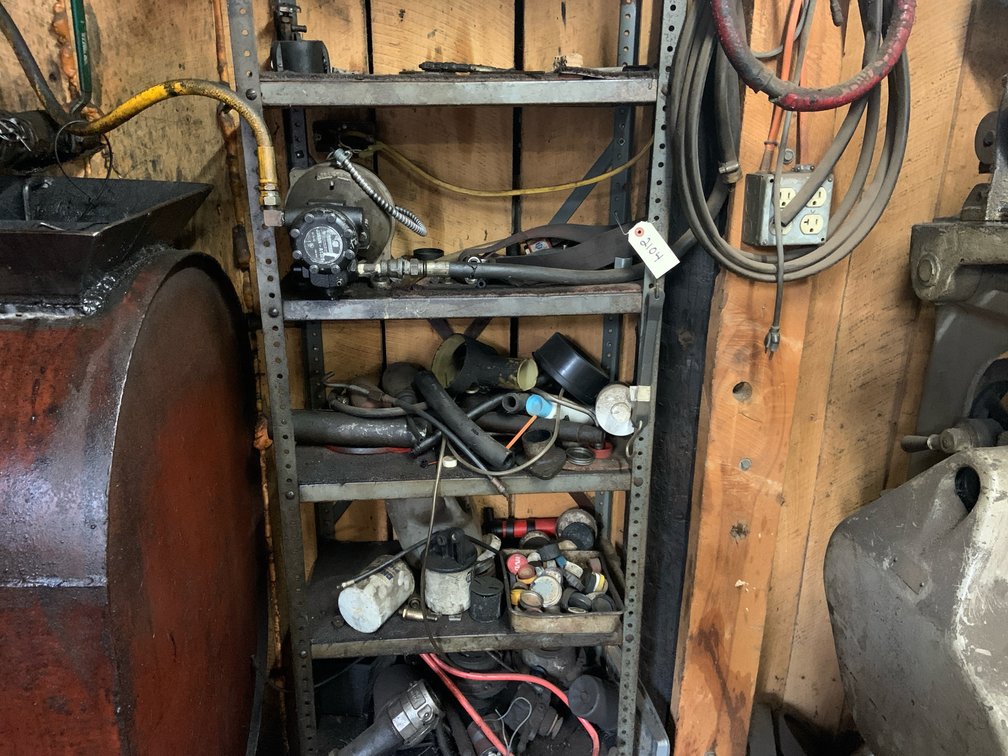 Metal Shelf With Caps, Automotive Hoses