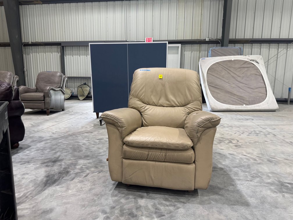 Beige Leather Manual Recliner Armchair With A Tufted Back Cushion