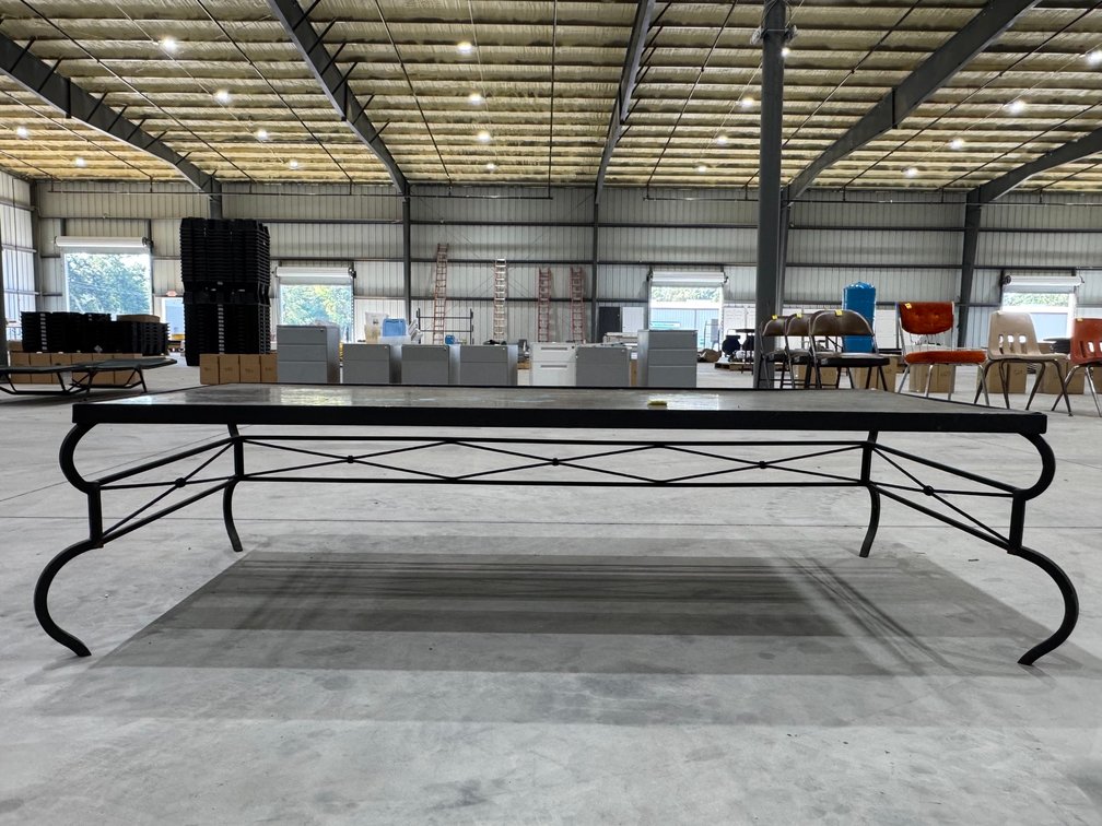 Coffee Table With A Black Wrought-Iron Scroll Base