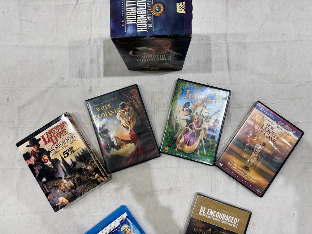 Assorted DVDs: Disney Frozen Blue-Ray, Disney Tangled, Etc.