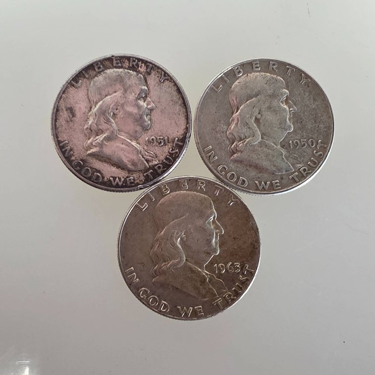 Three Franklin Half Dollars: 1950-D, 1951, 1963-D