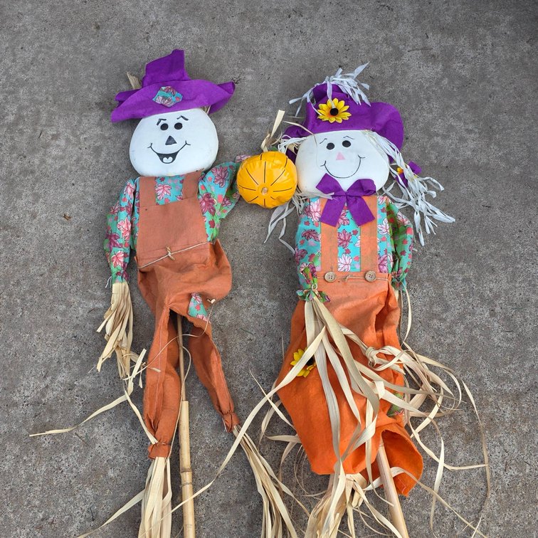 Decorative Scarecrows with Sticks and Orange Overalls