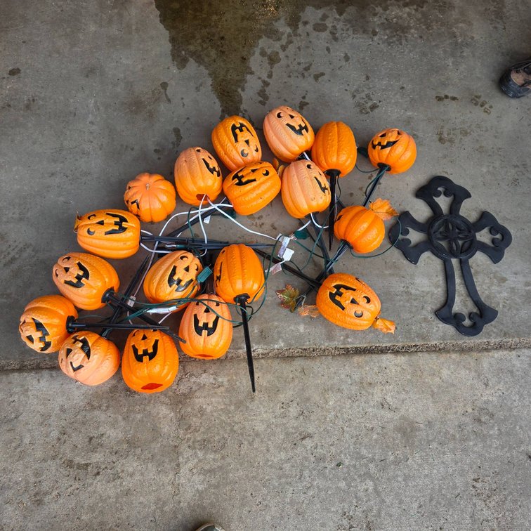 Plastic Jack-o’-Lantern Stake Lights and Decorative Cross