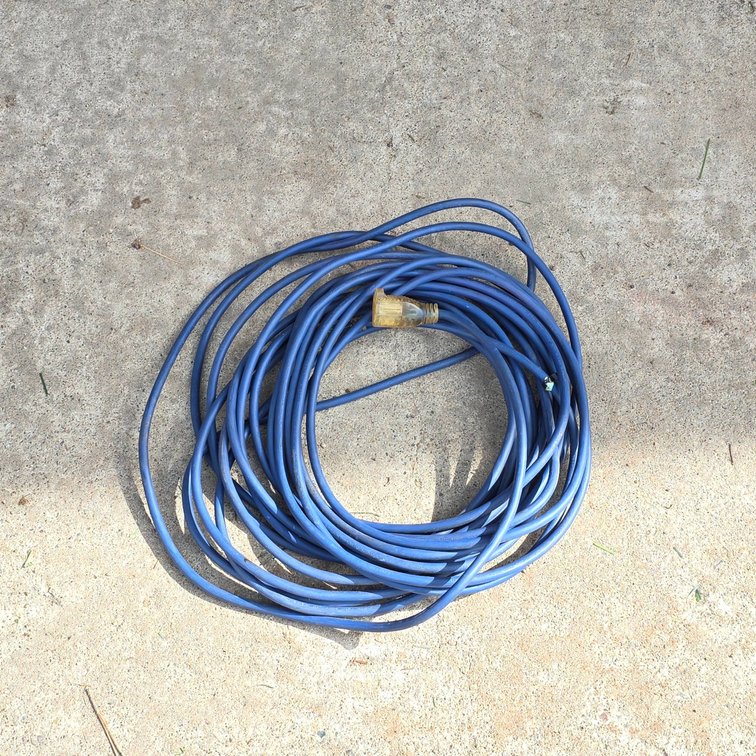Blue Heavy-Duty Extension Cord with 300V Rating and Transparent Plug Ends