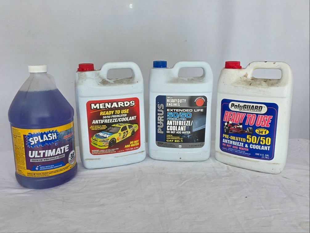 Four Containers of Antifreeze and Windshield Washer Fluid