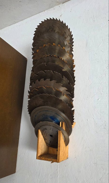 14 Saw Blades, Mostly 10 Inch, with Wooden Holder