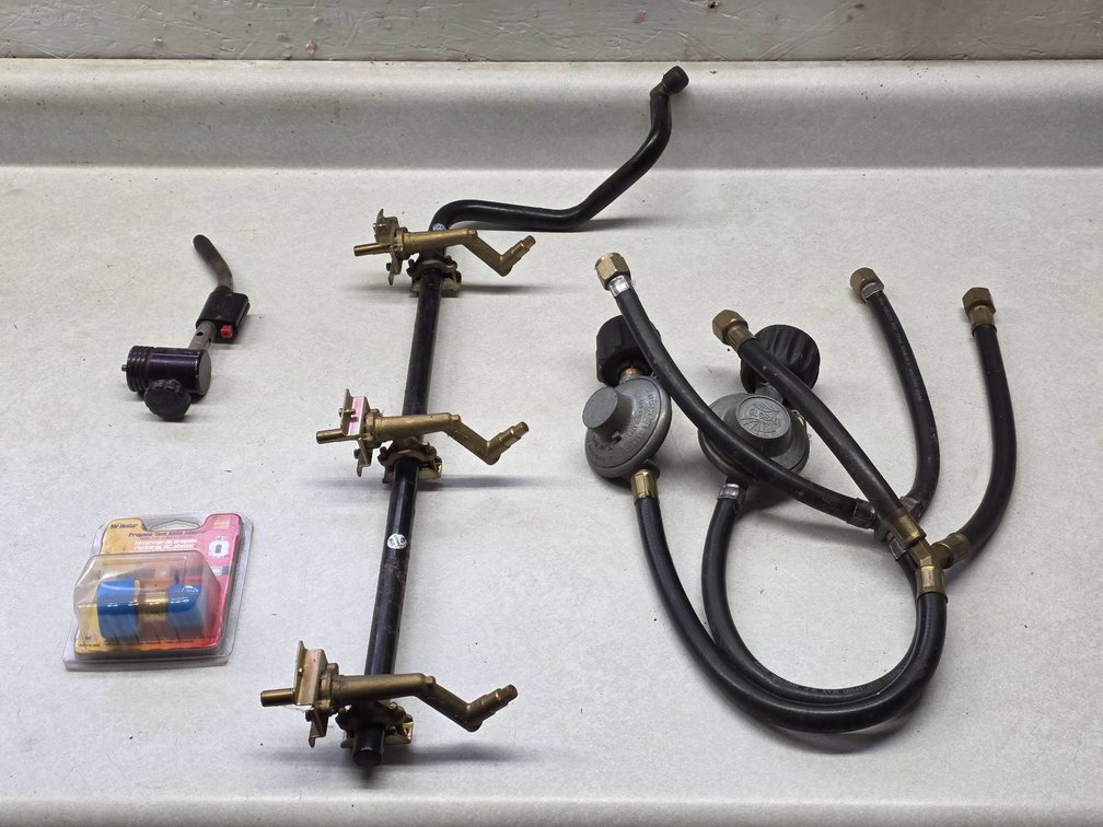 Propane Equipment Lot With Tank Refill Adapter, Torch, Regulators, and Grill Manifold