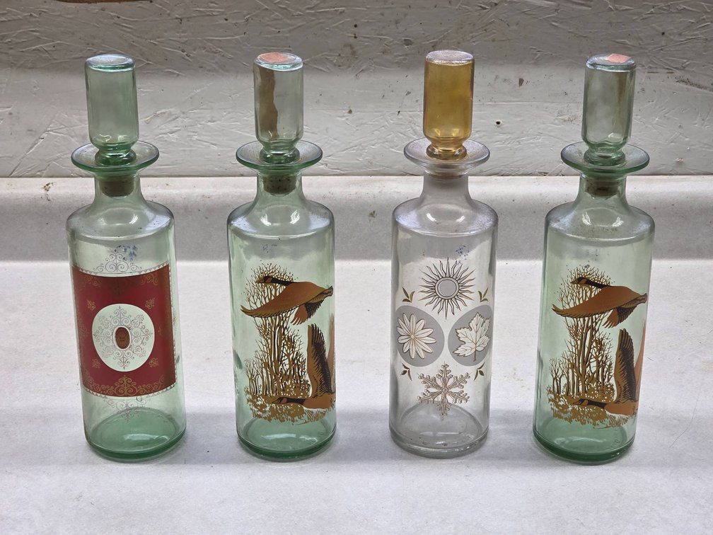 Four Antique Glass Whiskey Bottles With Painted Depictions