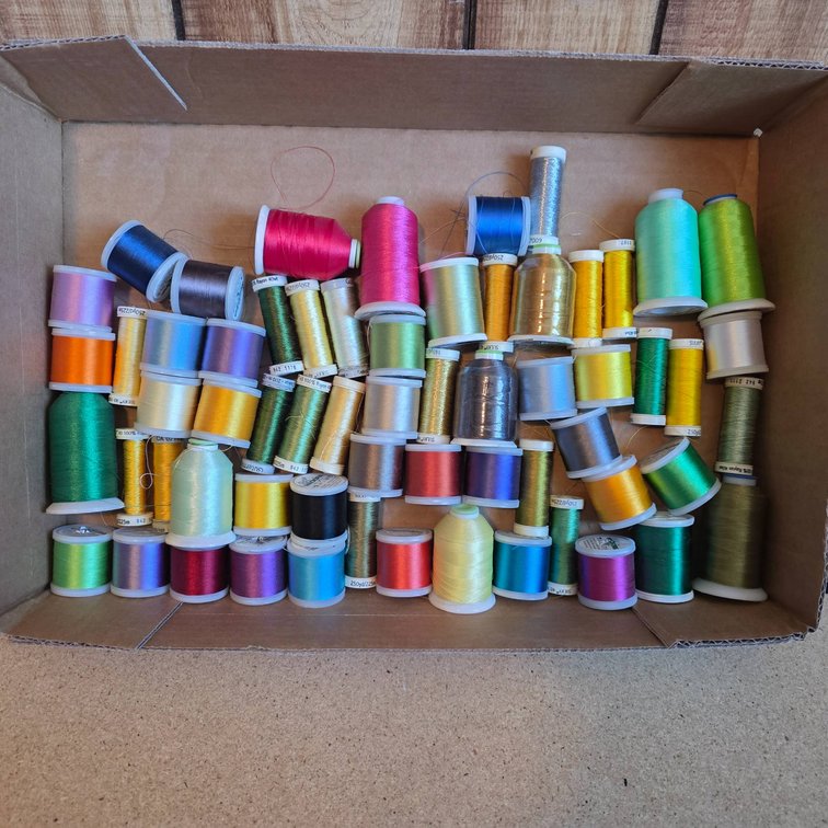Spools of Polyester and Rayon Embroidery Thread, New and Partial Rolls