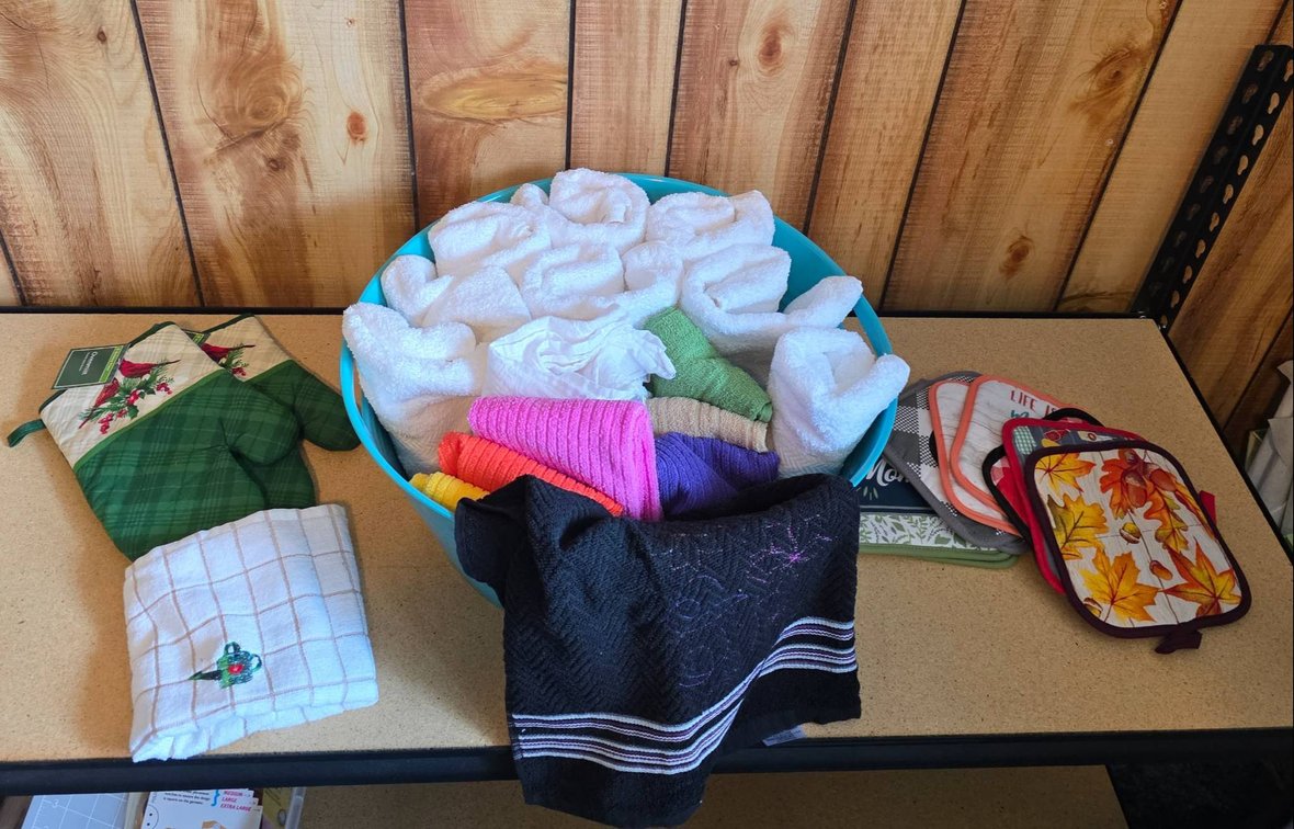 Large Teal Tub with Assorted Kitchen Textiles
