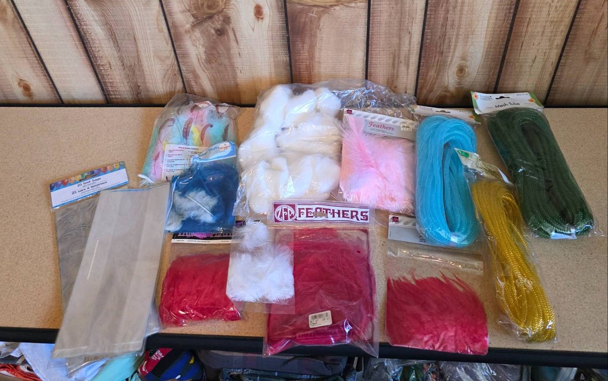 Crafting Supplies Including Feathers, Tulle, and Fluff