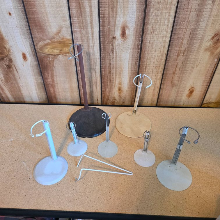 Seven Doll Stands 