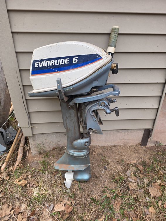Evinrude 6 Outboard Motor with Handle and Propeller
