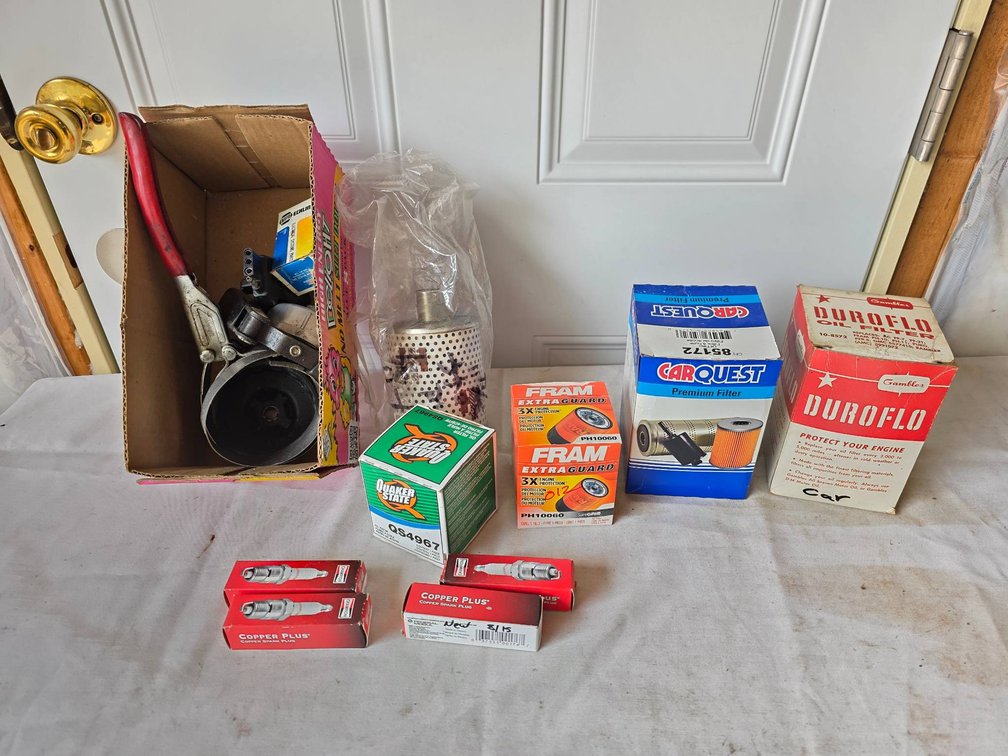 Automotive Oil Filters, Spark Plugs, and Filter Wrench Tools