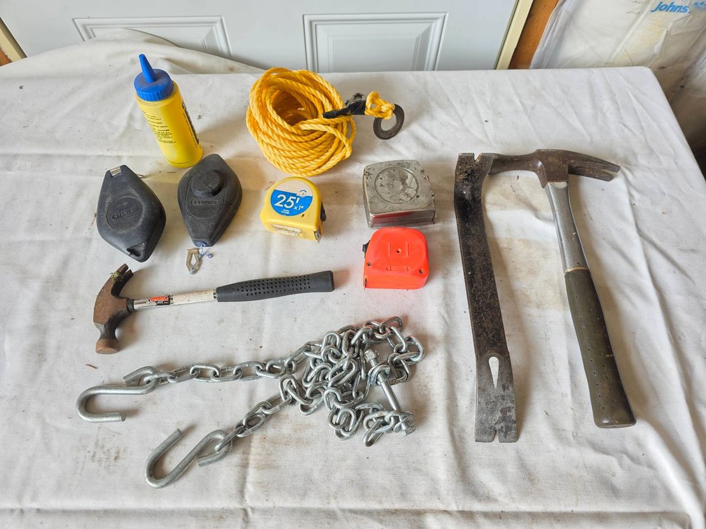 Garage Lot with Pry Bar, Hammers, Measuring Tapes, and Miscellaneous Tools