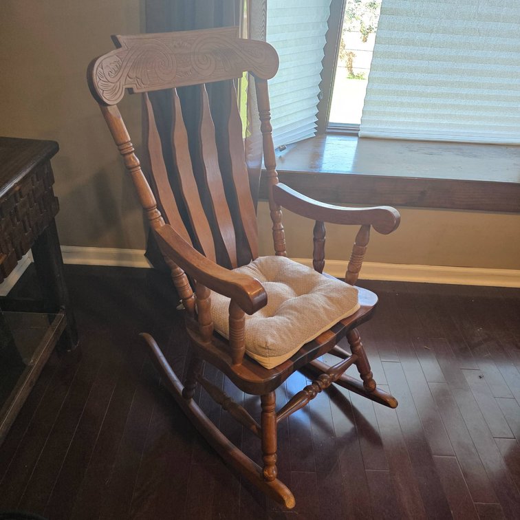 Wooden Rocking Chair with Carved Backrest and Cushion