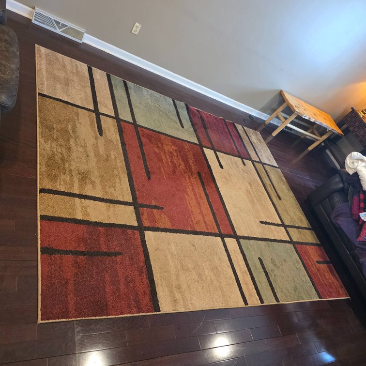 Rectangular Area Rug With Geometric Design