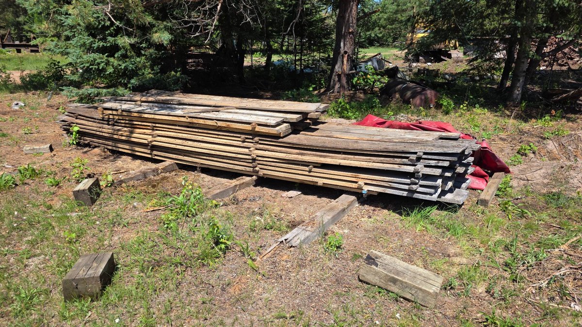 Large Stack of Rough-Cut Lumber in Various Thicknesses and Lengths up to 22 ft