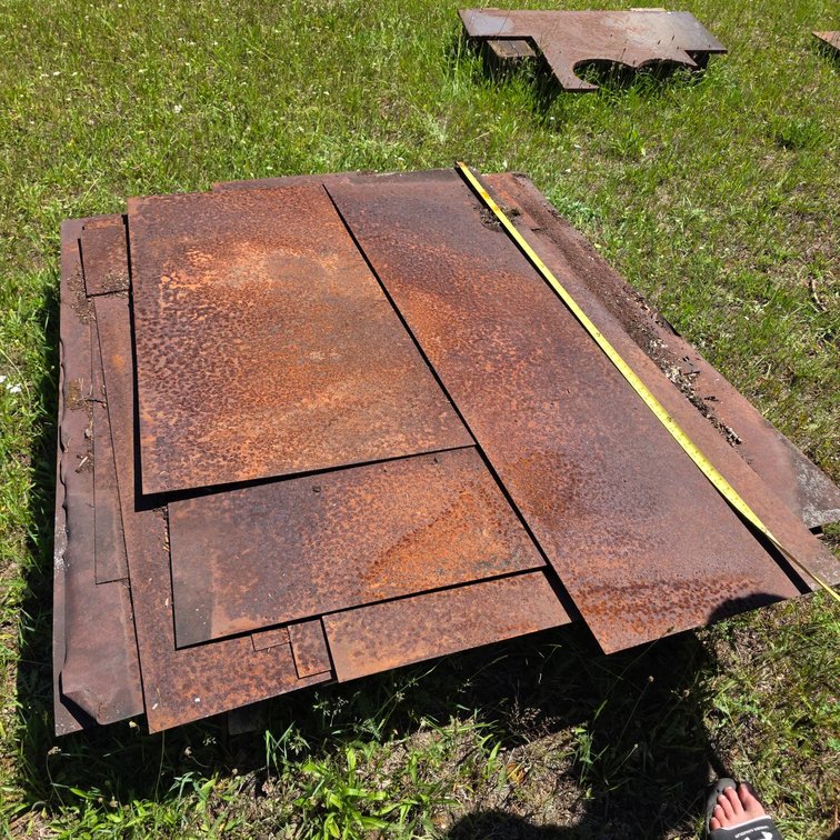 About One Dozen Sheet Steel Panels, Approximately 1/16 inch Thick