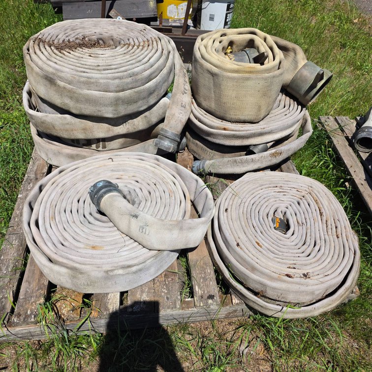 11 Rolled Fire Hoses with Metal Couplings