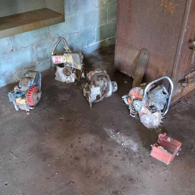Old Chainsaw Parts Including Kee-Line and Lombard Components