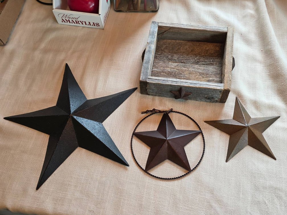 Three Metal Stars and Wooden Box