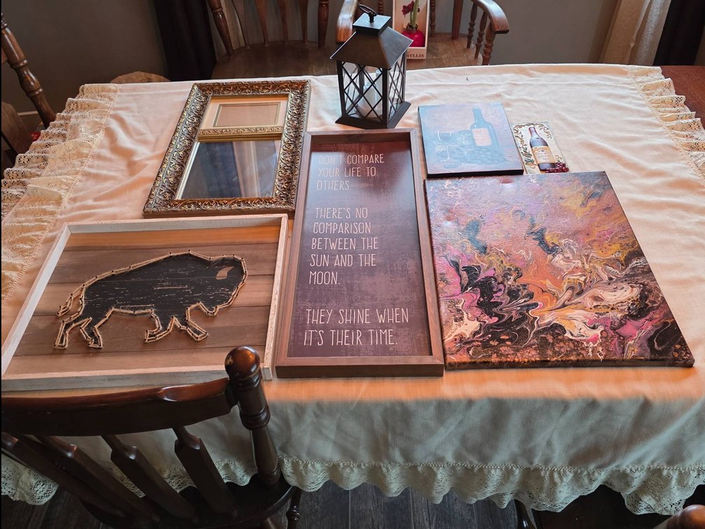 Decorative Items Including Wall Art, Lantern, and Mirror