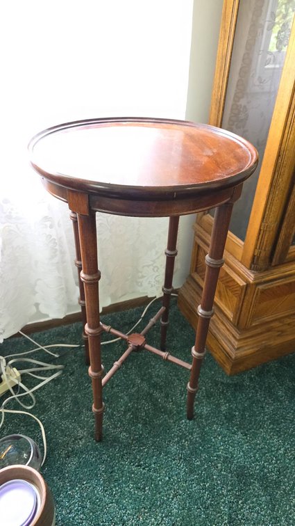 Mid-Century Mahogany Round Top Stand with Segmented Legs and X Stretcher