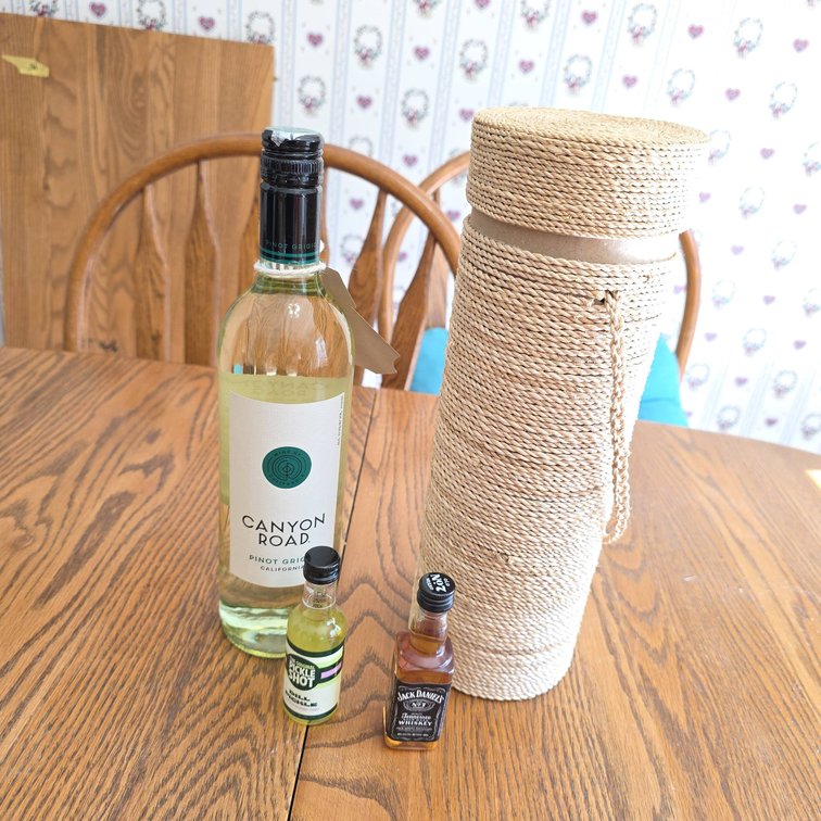 Canyon Road Pinot Grigio, Pickle Shot, Jack Daniel's Miniature, and Rope Bottle Holder