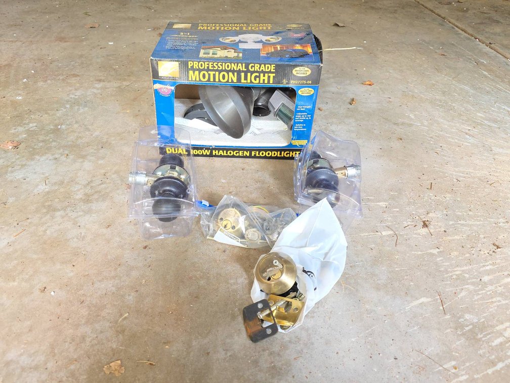 Professional Grade Motion Light, Two Closet Door Knobs, and Deadbolts Assortment
