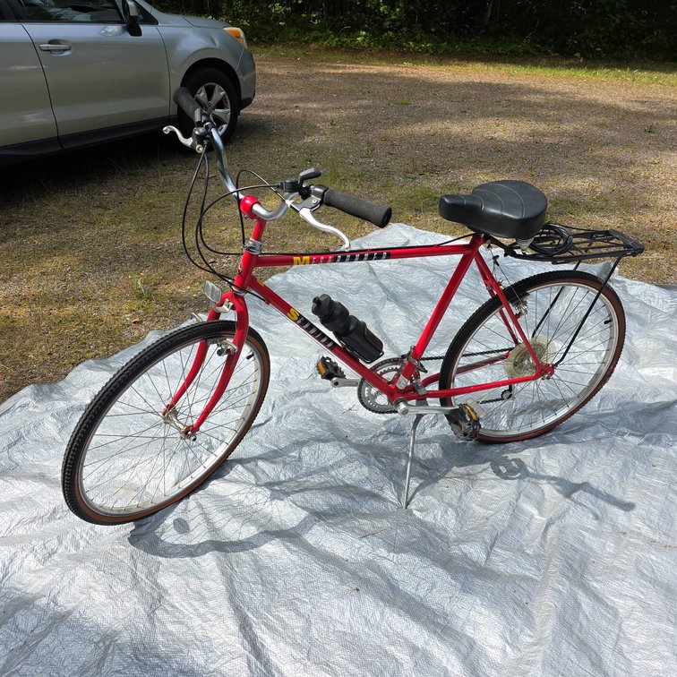Schwinn Mesa Runner Red Hybrid Bike with Water Bottle and Rear Rack