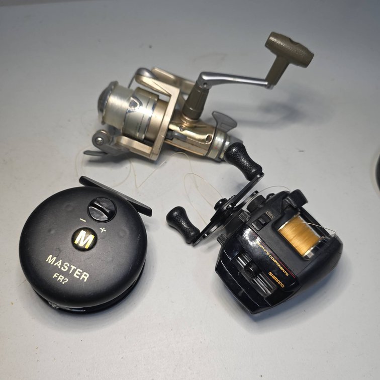 Shimano Casting Reel, Shimano Spinning Reel 2000, and Master FR2 Fly Reel