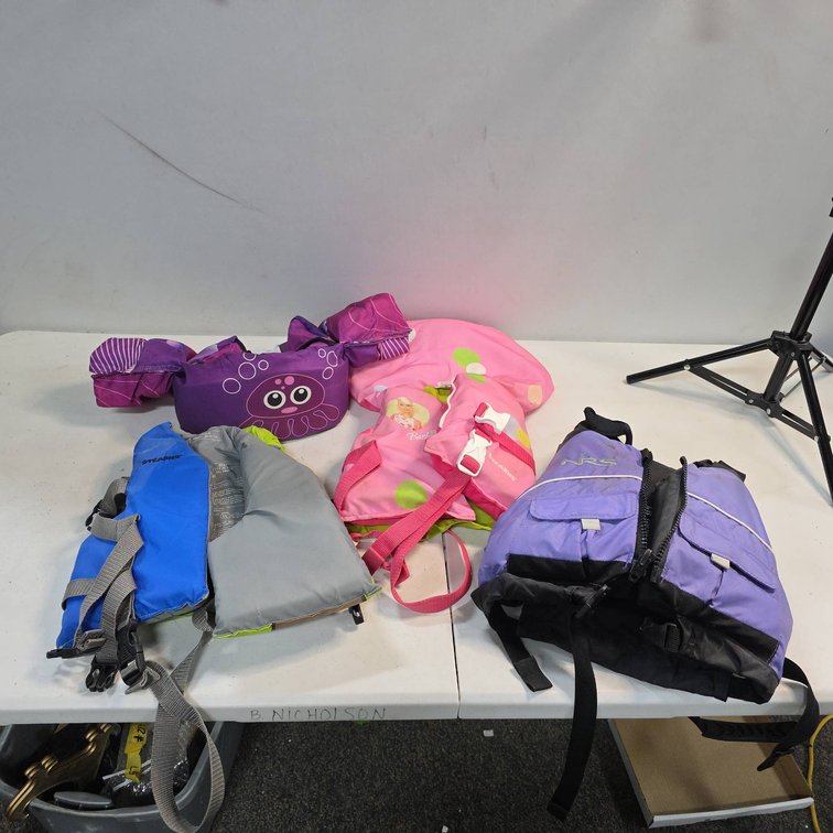 4 Child Size Life Jackets Including Stearns, NRS, Barbie, and Animal Print Arm Vest