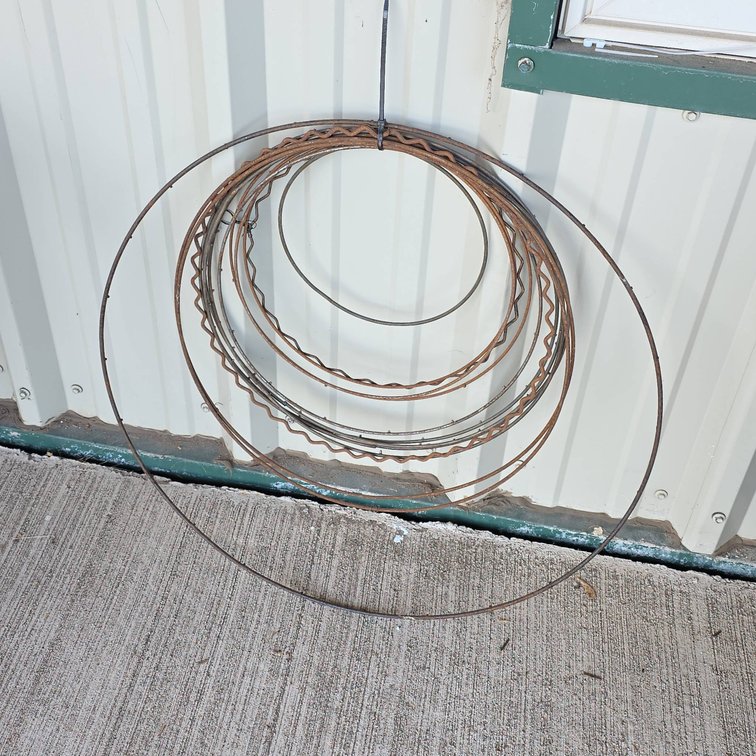 Approximately 13 Metal Wreath Forms, Largest 24 Inch Diameter, Various Patterns and Sizes