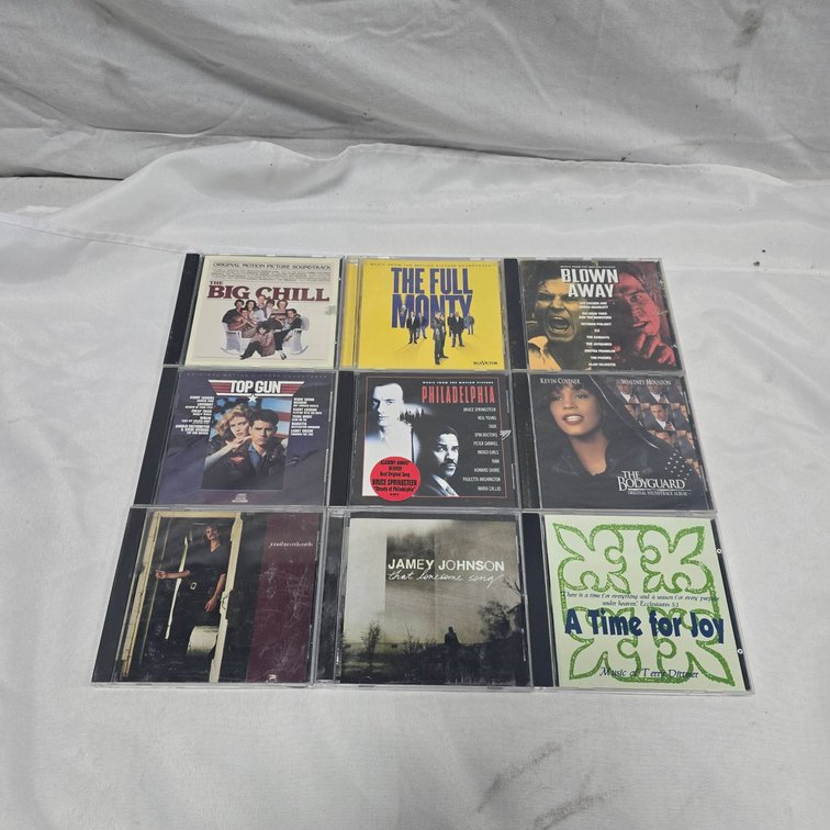 9 Music CDs Including Soundtracks: Big Chill, Full Monty, Blown Away, Top Gun, Philadelphia