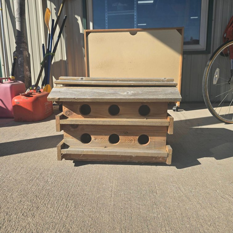 Wooden Multi-Compartment Birdhouse with Sloped Roof and Circular Entrances, Measures 23x21x16 Inches