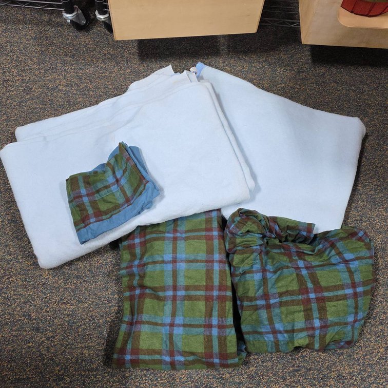 (2) Twin Size Blue Polyester Blankets, Plaid Twin Flat and Fitted Sheets, and One Pillow Case