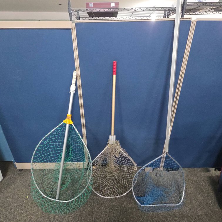 Three Large Fishing Nets Including One With Extendable Handle and Varied Mesh Designs