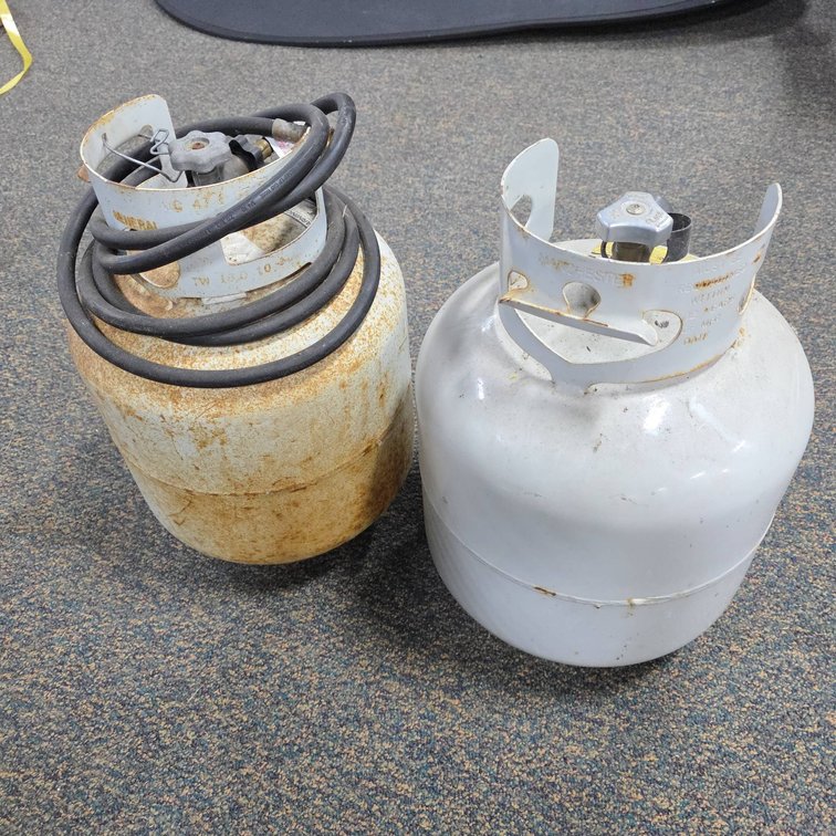 15-Pound LP Gas Tanks, One Mostly Empty With Hose Included