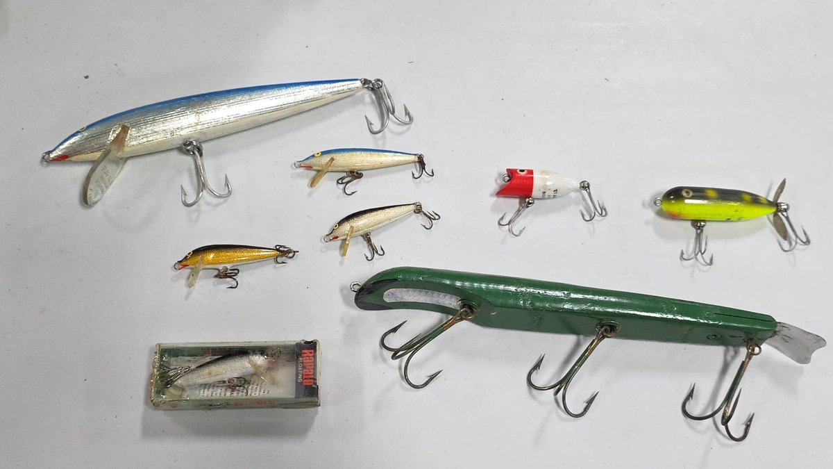Rapala, Heddon, and Sewick Fishing Lures Assortment Including Boxed Rapala and Vintage Designs