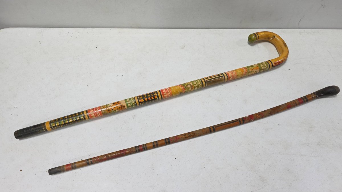 Two Hand Carved Central American Canes with Painted Animal and Plant Motifs