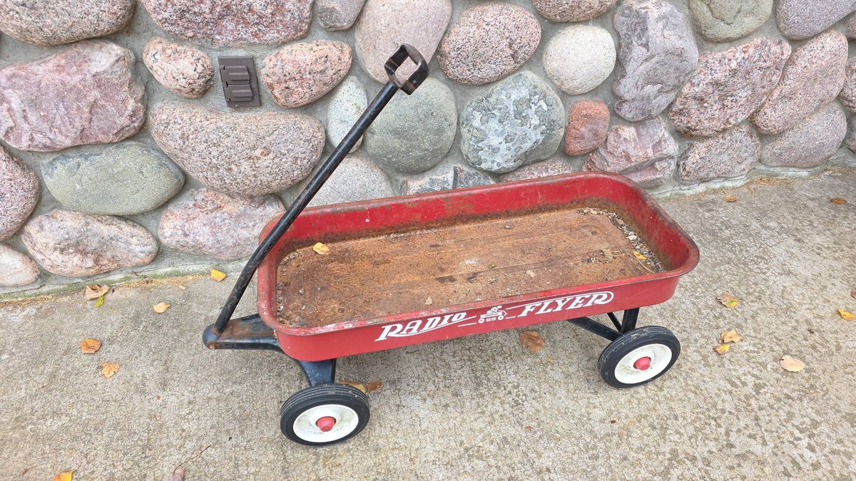 Radio Flyer Red Steel Wagon with Pull Handle and White Wheels