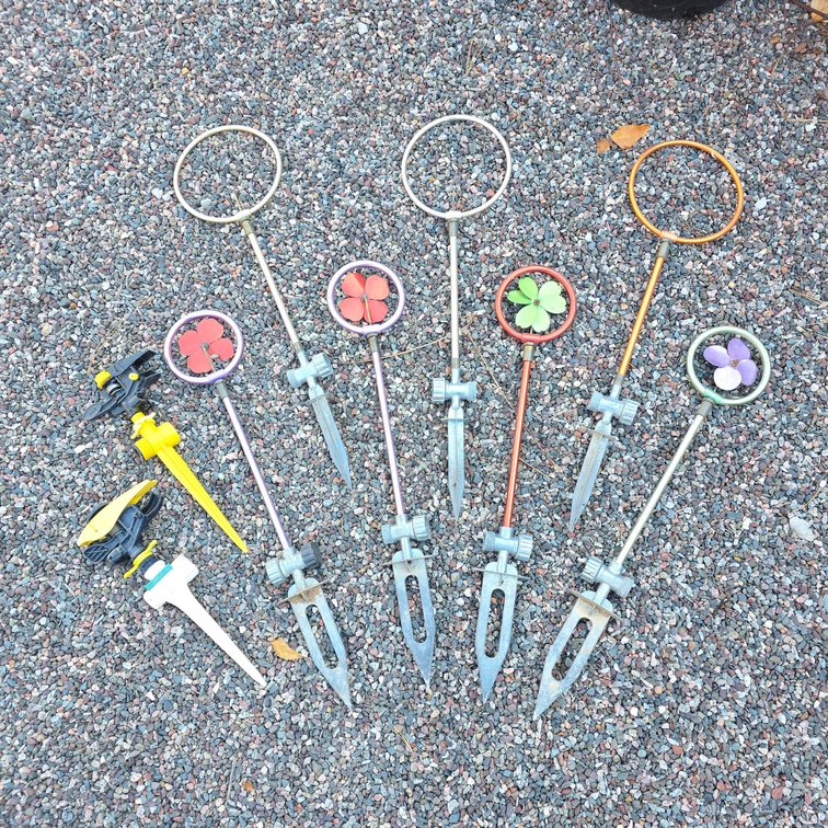 7 Metal Garden Sprinkler Stakes with Decorative Flower Heads and 2 Plastic Impact Sprinklers