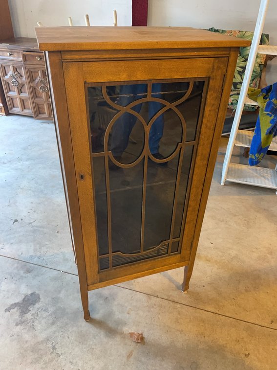 Glass Front Wooden Entertainment Cabinet With Decorative Metal Detail, No Handle Or Key