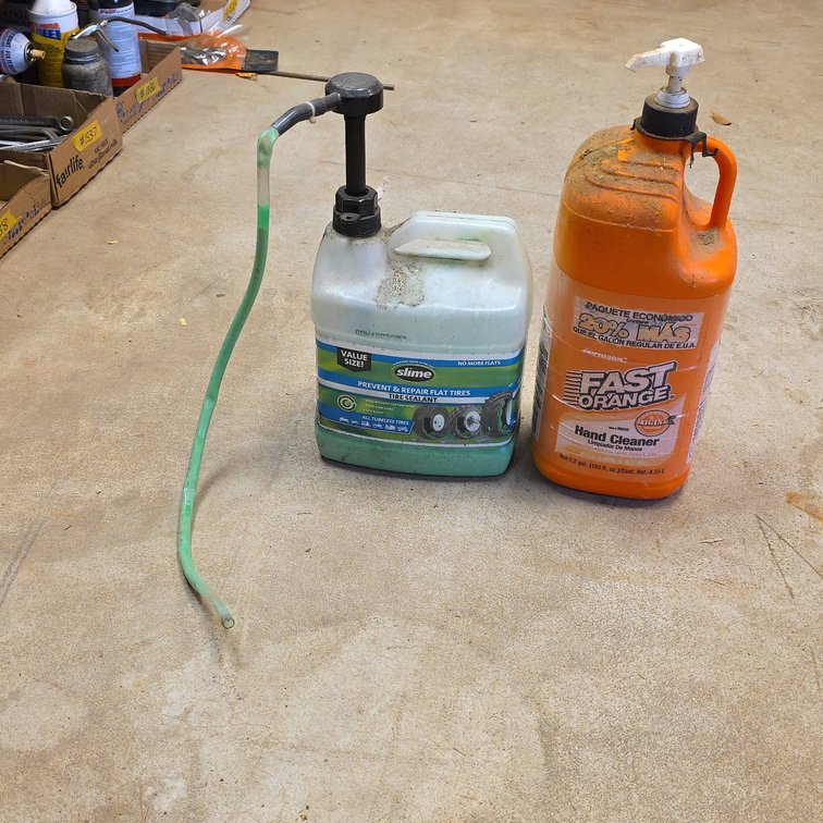 Slime Tire Sealant Pump Jug and Permatex Fast Orange Hand Cleaner Dispenser, Both Partially Full