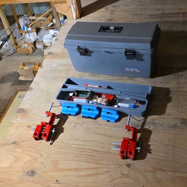 Plastic Tool Box With Organizer Tray, 3 Blue Cases, and 2 Red Bench Vises