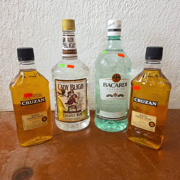 4 Rum Bottles: Cruzan Aged Dark Rum, Lady Bligh Coconut Rum, Bacardi Superior