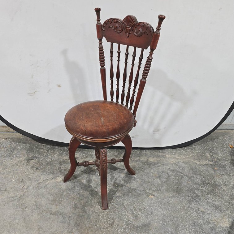 Antique Wood Spindle Back Chair with Carved Crest, Adjustable Seat Height, Measures 38 In Tall