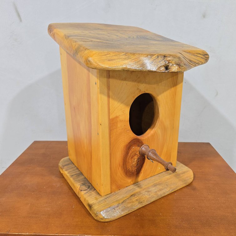 Handcrafted Wooden Birdhouse with Perch and Natural Wood Grain Finish