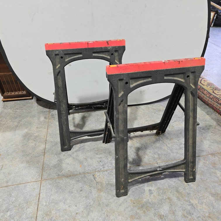 Plastic Folding Sawhorses with 397 lb Rating Each, One with Broken Bottom Cross Brace and Guideposts